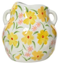 Add elegance to any room with this exquisite porcelain vase