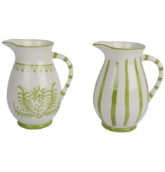 A mix of 2 dolomite jugs with a hand finished painted design.