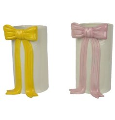 A mix of 2 unique vases, each decorated with a colourful bow. A beautiful gift item and interior accessory for the home.