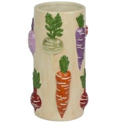 A colourful and quirky 3D vase featuring an abundance of homegrown vegetables. 