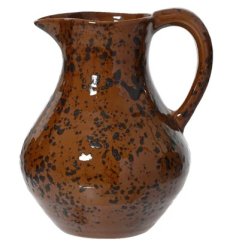 Bring warm, natural style to your table with the Jug Terracotta Dots design.