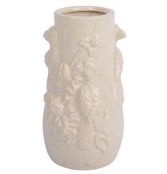 A beautifully detailed tropical birds design vase, complete with a cream reactive glaze finish. 