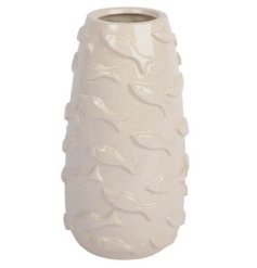 A classic shaped vase with 3D fish and a stylish cream reactive glaze. 