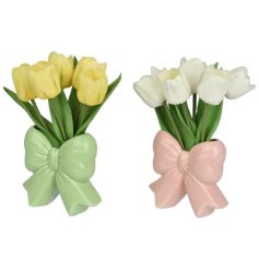 Enhance your space with the elegant Tulip bow vase, a perfect decor accent for any room.