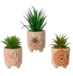 A mix of 3 artificial succulents beautifully presented in a floral stoneware pot. 