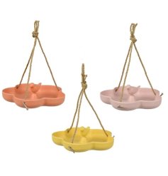 A mix of 3 colourful flower shaped bird feeders in vibrant pink, yellow and orange hues. 