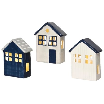 A mix of 3 charming coastal inspired houses with warm glow LED lights.