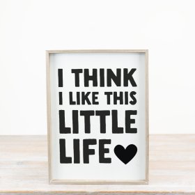 Add charm to your home with the "I Think I Like This Little Life" sign