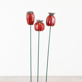 Elegant floral patterns on metal stakes, perfect for enhancing your garden’s beauty.