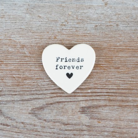 A charming porcelain heart keepsake, perfect for celebrating lifelong friendships.