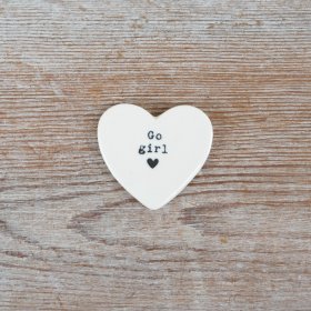 White glazed heart token featuring black text and a delicate heart design.