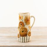 This rustic and warming jug exudes gorgeous colours of burnt orange and buttercup yellow