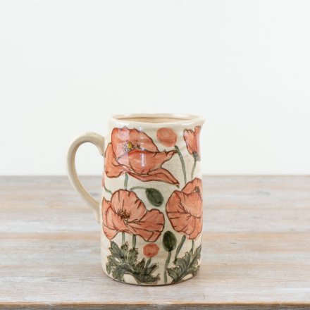 Charming jug-shaped vase featuring beautiful poppy illustrations for a stylish touch.