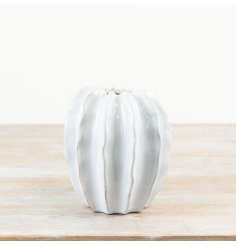 Discover this off-white glazed botanical pod vase, a charming addition to your decor.