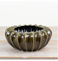 Introducing this gorgeous pod bowl vase in a glazed Olive green colour. 