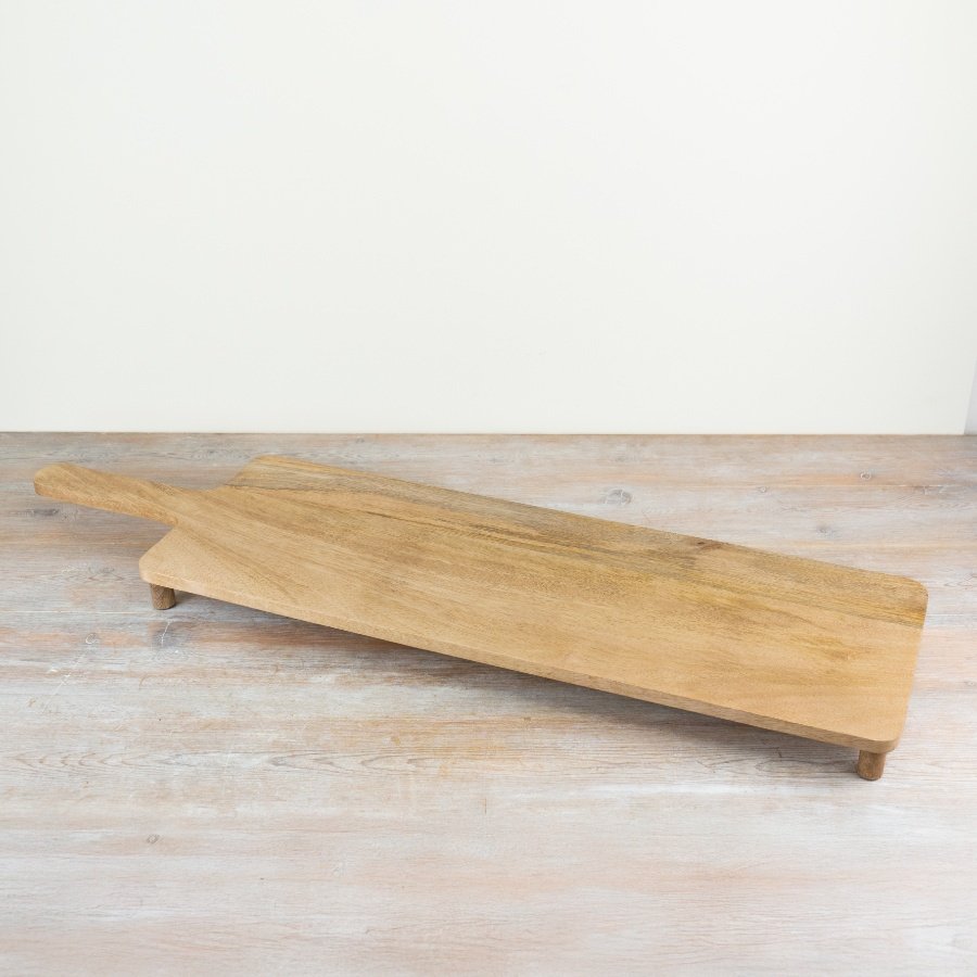 Sturdy wooden chopping board, roomy and stylish, perfect for a clean, efficient kitchen setup.