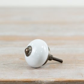 Chic white door knob with a modern design for a sleek, elegant touch.