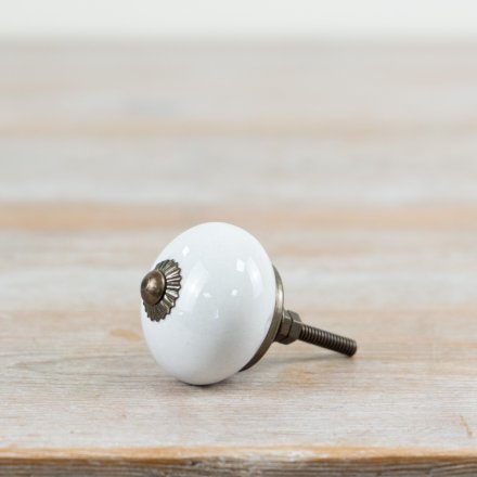 Sleek white door knob with a modern design for a chic, clean look.