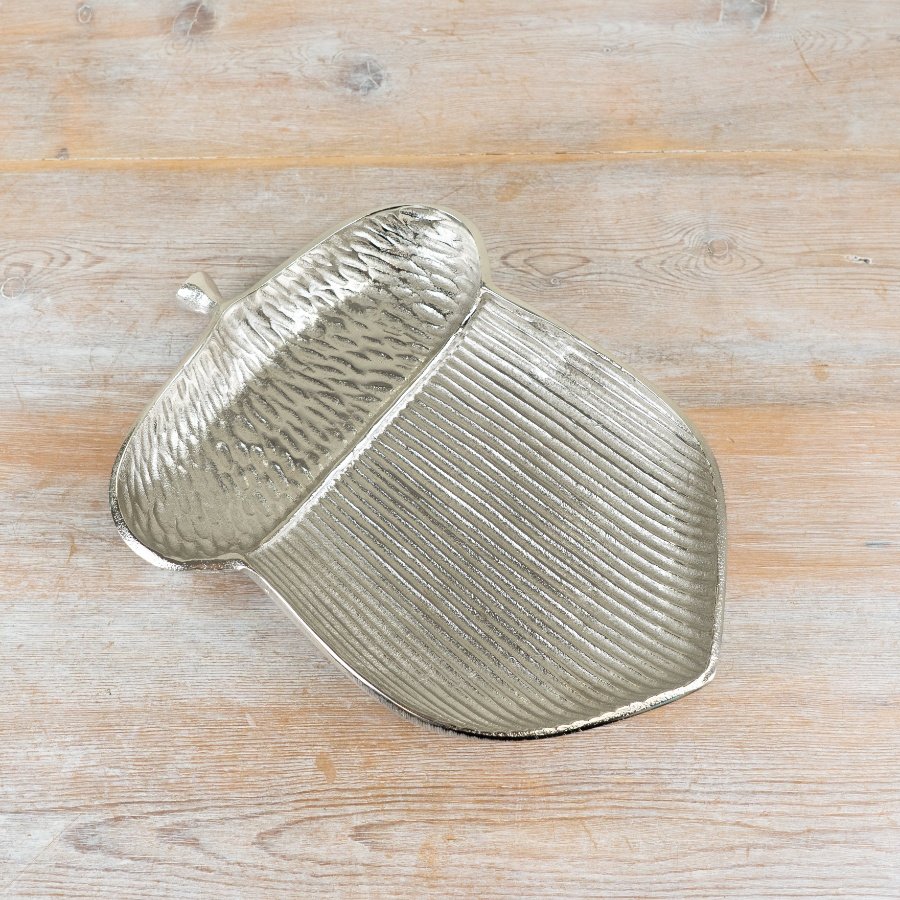Elegant silver dish perfect for holding small treasures.
