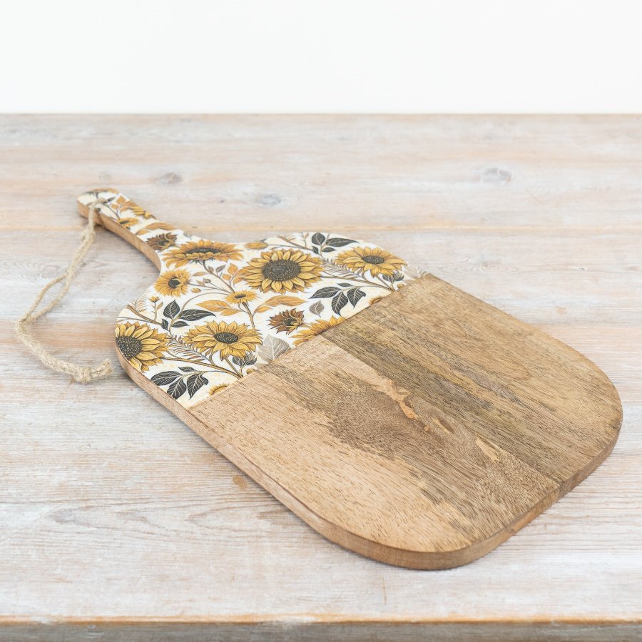 Add a splash of colour to the home with this beautiful sunflower design enamel and wooden board. 