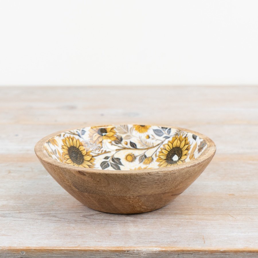 A charming mango wood bowl with a beautiful sunflower print on enamel. 
