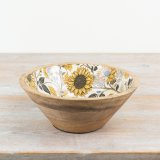 A beautifully crafted mango wood bowl with an enamel centre. Decorated with a warm sunflower pattern. 