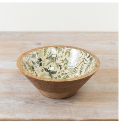 A mango wood and enamel bowl featuring a beautiful butterfly and fern design. 