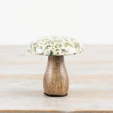 A beautifully crafted mango wood mushroom ornament with a colourful and earthy fern design. 