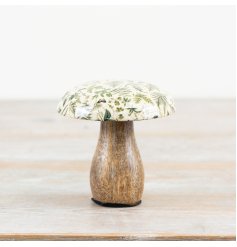 A beautifully crafted mango wood mushroom ornament with a colourful and earthy fern design. 