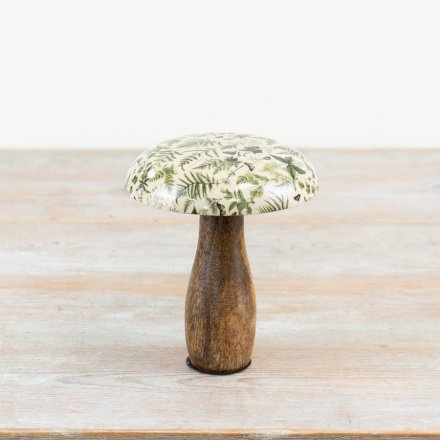 A stylish mushroom ornament crafted from mango wood with an enamel cap. 