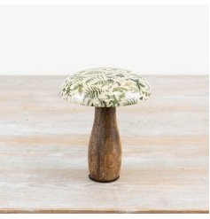 A stylish mushroom ornament crafted from mango wood with an enamel cap. 