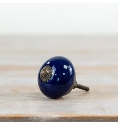 Enhance your home’s style with this vintage-inspired blue ceramic door knob.
