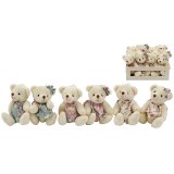 Add a charming, whimsical touch to any room with this floral bear hanger 