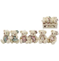 Add a charming, whimsical touch to any room with this floral bear hanger 