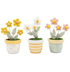 Brighten any space with this 14cm yellow fabric flower in a wooden pot