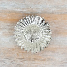 Elegant flower dish featuring a sleek silver tone and intricate sunflower pattern.