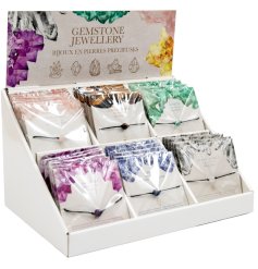 6 assorted gemstone bracelets each containing different crystals. 