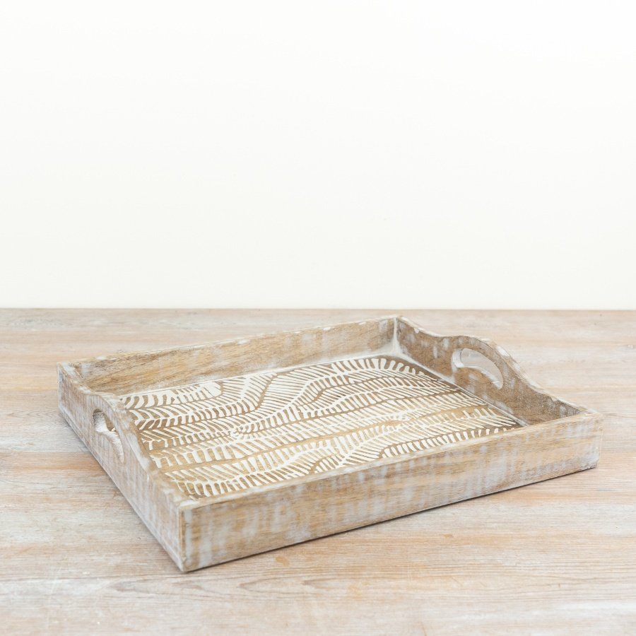 Charming whitewashed wooden tray with an elegant design for stylish serving and decor.