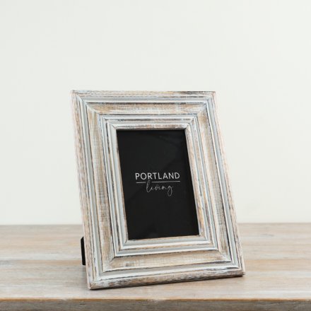 Whitewashed frame with a charming rustic design
