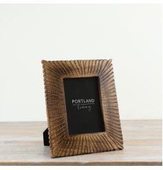 Elegant 5x7 wooden photo frame with polished finish and clear glass front
