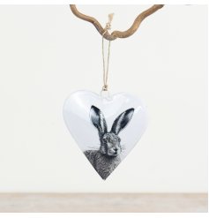 Add a charming touch to any space with the Rabbit Metal Hanging Heart