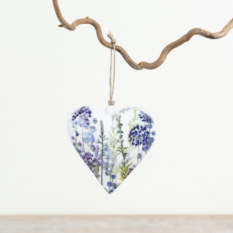 Elegant heart-shaped hanger adorned with lovely lavender blooms, a classic decorative piece.