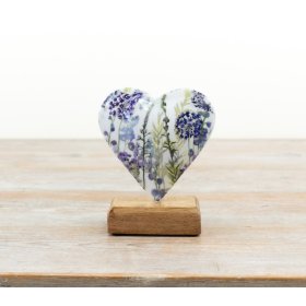Delightful heart-shaped sculpture on a stand