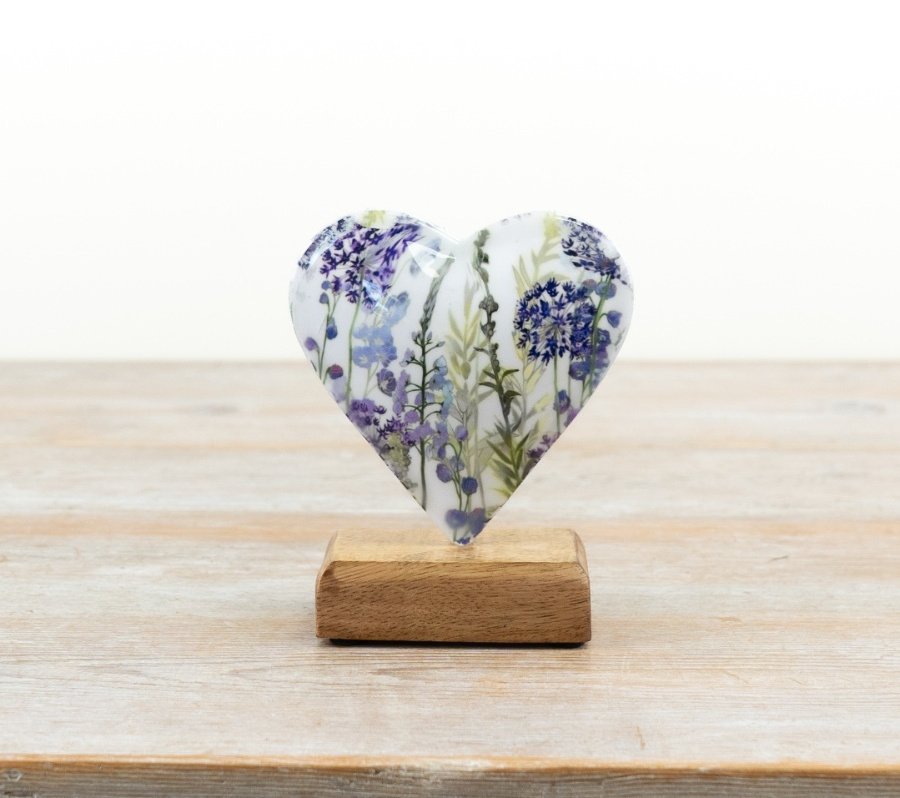 Delightful heart-shaped sculpture on a stand