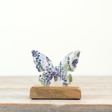 Delight in nature’s beauty with this charming iron butterfly ornament