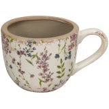 a stylish mug planter with floral design pattern 