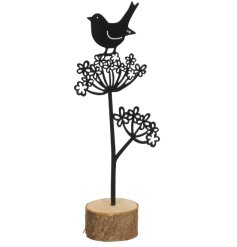Add rustic charm to your space with the Flower With Bird ornament