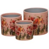 Add charm to your space with this set of 3 rose-colored stoneware planters, 