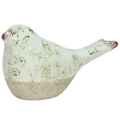 An ornament gracefully combining bird and floral designs for a stylish touch.