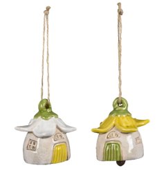 Bring charm home with this lovely stoneware House featuring a flower-adorned roof decoration.